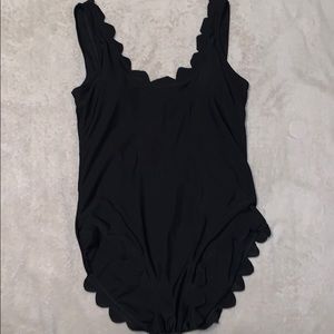 Black scalloped one piece bathing suit